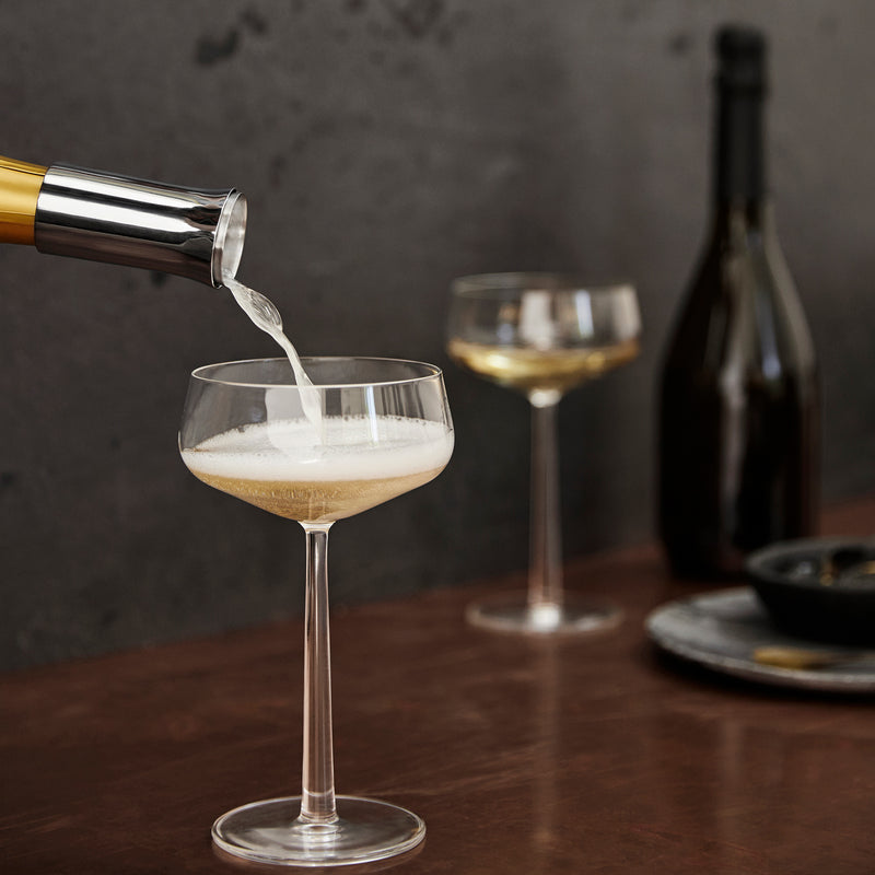 champagne pourer into glass